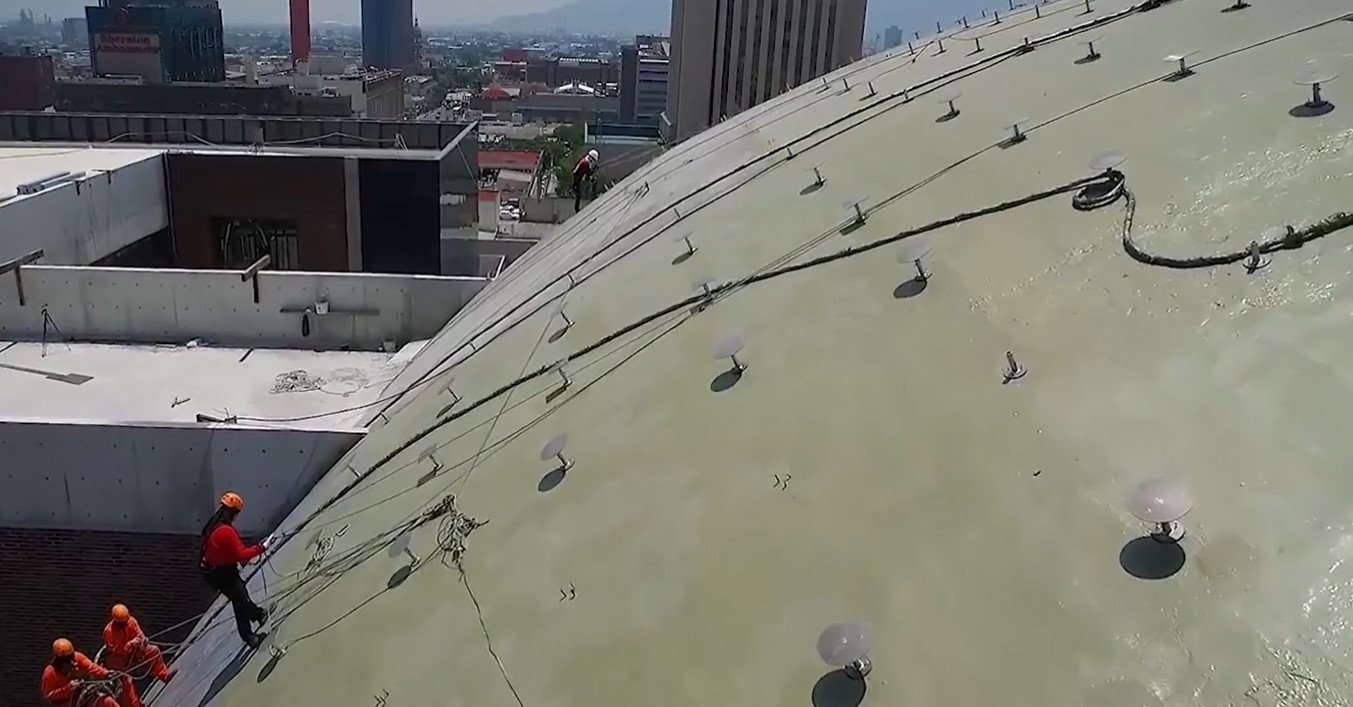 Spray roof technicians on a roof