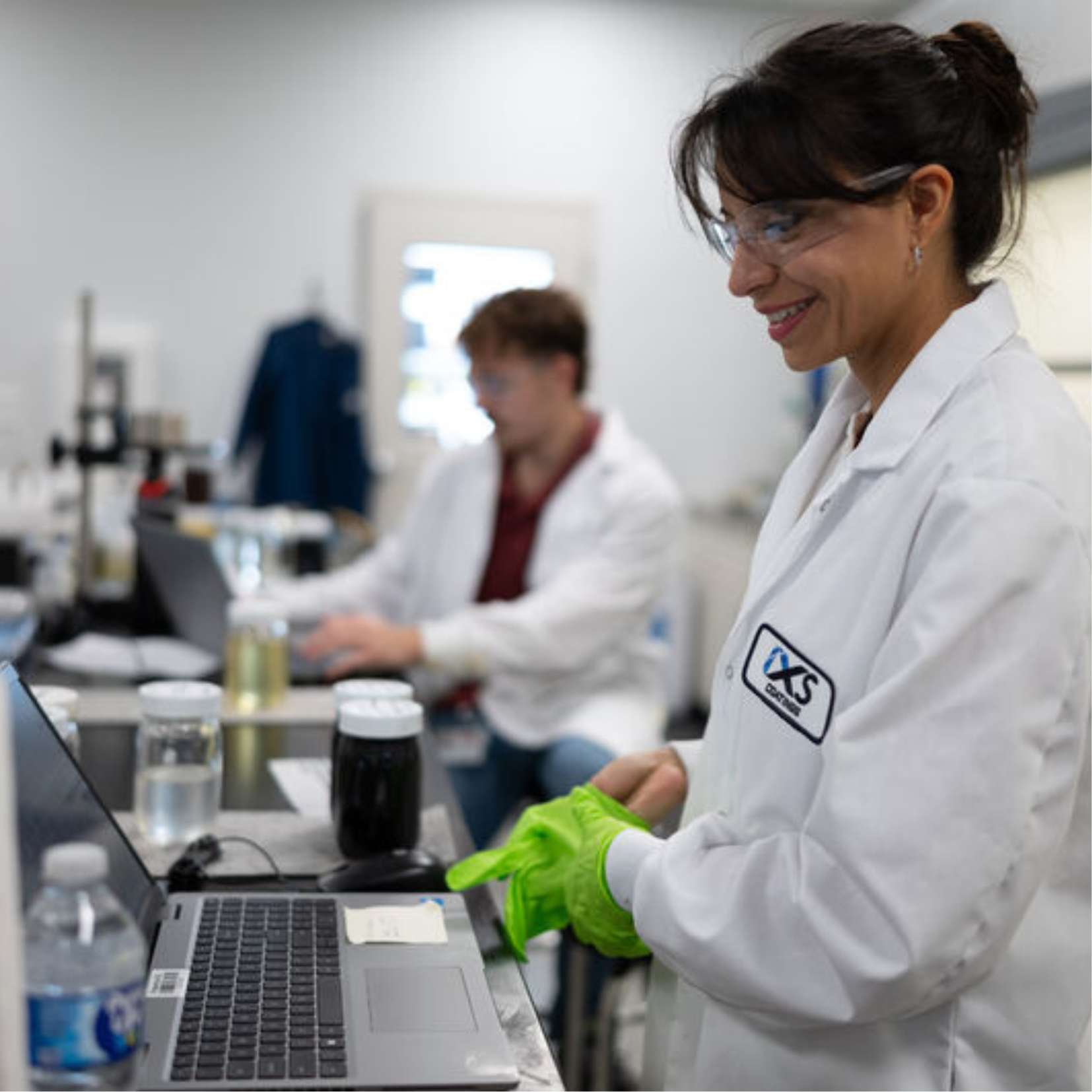 Industrial coating application in a controlled environment