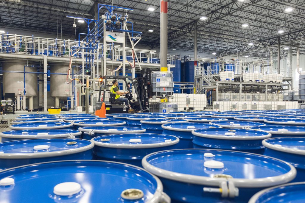 Warehouse with barrels of polyurea